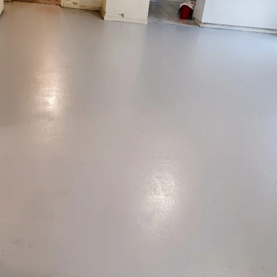 Solid colour grey epoxy floor in a commercial space