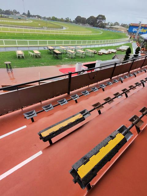 Grandstand Seating Terraces Coated in Terracotta Red