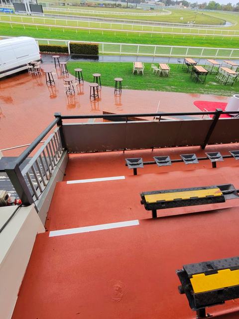 Grandstand Seating Terraces Coated in Terracotta Red — photo 2