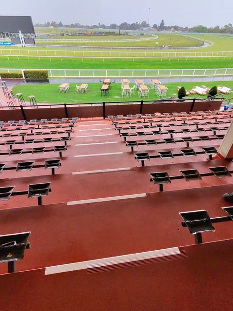 Grandstand Seating Terraces Coated in Terracotta Red — photo 3