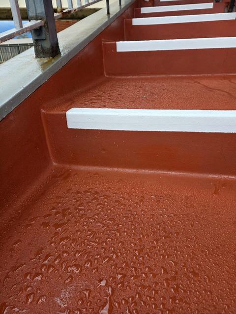 Grandstand Seating Terraces Coated in Terracotta Red — photo 4