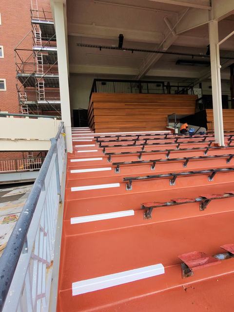 Grandstand Seating Terraces Coated in Terracotta Red — photo 5