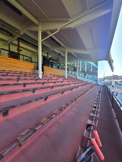 Grandstand Seating Terraces Coated in Terracotta Red — photo 9