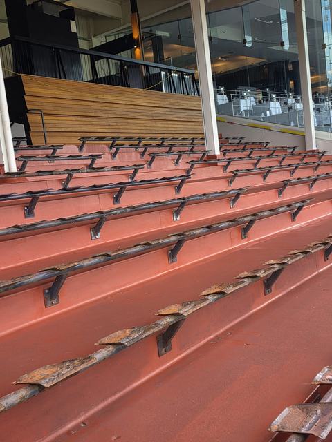 Grandstand Seating Terraces Coated in Terracotta Red — photo 11