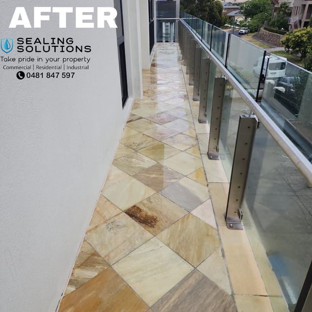After: the same stone walkway cleaned, with the warm stone colour restored